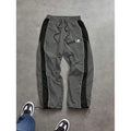 Men's spliced color-blocking printed casual pants with drawstring cuffs and loose straight-leg trousers